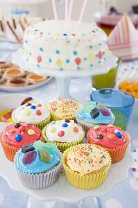 Birthday party table setting with food
