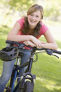 Teenage Girl On Bicycle