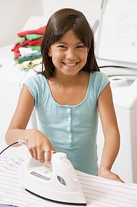 Young Girl Ironing 