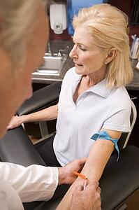 Middle Aged Woman Having Blood Test Done