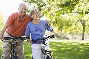 Senior couple on bicycles