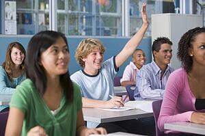 Students answering questions in geography class