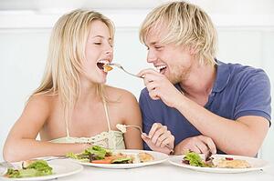 Young Couple Enjoying meal, mealtime Together