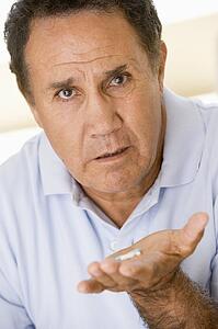 Man Taking Pills