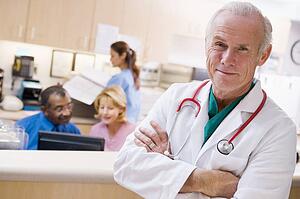 Doctors And Nurses At The Reception Area Of A Hospital