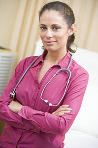 A Doctor Standing In A Hospital Ward