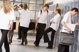 Secondary school students in a school hallway