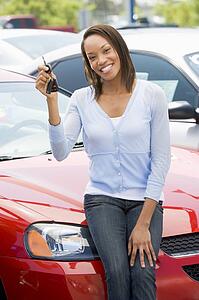 Woman shopping for a new car