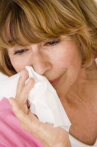 Woman Blowing Her Nose