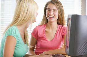 Teenage Girls Using Desktop Computer
