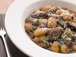Oxtail Braised in Red Wine with Basil Gnocchi and Parmesan Cheese