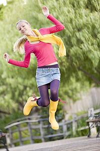 Teenage Girl Frolicking Outdoors