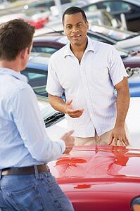 Man shopping for a new car