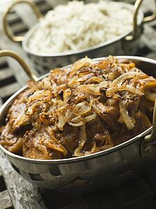 Dish of Dopiaza Veal with Fragrant Pilau Rice