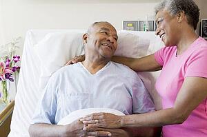 Senior Couple In Hospital Room