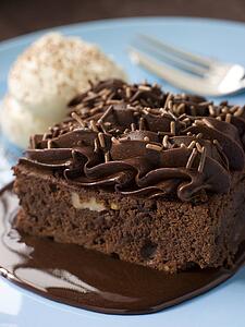 Chocolate Fudge Brownie With Chocolate Fudge Sauce And Cream