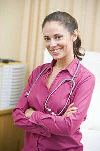 A Doctor Standing In A Hospital Ward