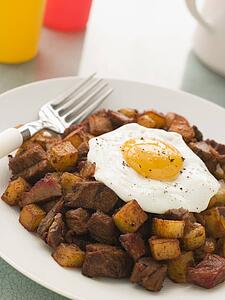 Corned Beef Hash With a Fried Egg and Black Pepper