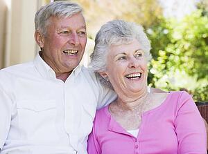 Senior couple sitting outdoors