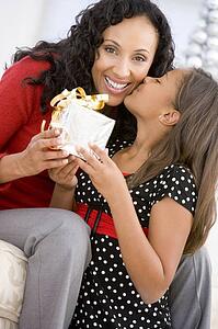 Mother Giving Daughter Her Christmas Present