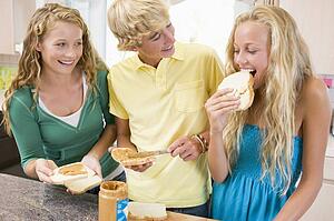 Teenagers Making Sandwiches