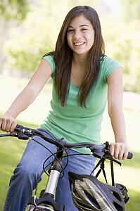 Teenage Girl On Bicycle