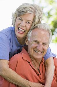 Senior couple sitting outdoors
