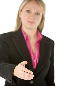 Businesswoman Holding Her Hand Out In Greeting