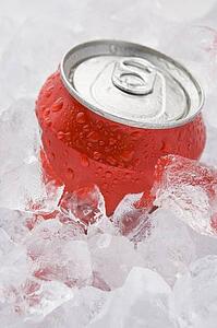 Red Can Of Fizzy Soft Drink Set In Ice 