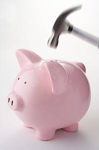 Hammer Aiming For Piggy Bank
