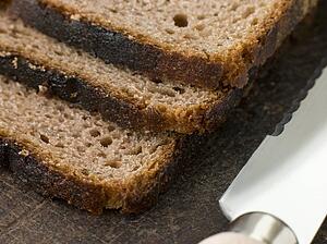 Slices of Rye Bread on a Chopping Board