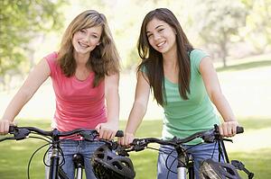 Teenage Girls On Bicycles
