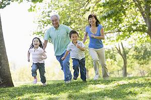 Grandparents running with grandchildren.