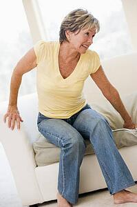 Woman Suffering With Back Pain