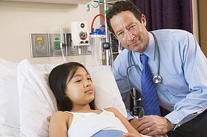 Doctor Checking Up On His Patient