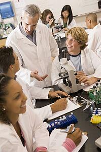 Students in physics class with teacher