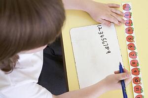 Student in class learning numbers (selective focus)