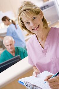 Nurses In The Reception Area Of A Hospital