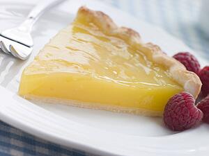 Slice of Lemon Curd Tart with English Raspberries