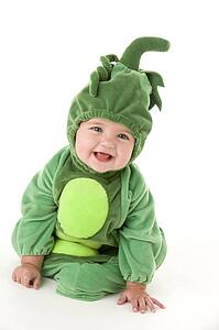 Baby in peas in pod costume smiling