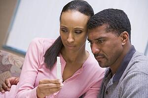 Couple with pregnancy test upset