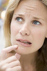 Head shot of worried woman