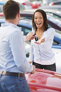 Woman shopping for a new car