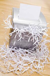 An Overflowing Paper Shredder