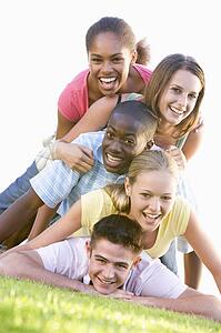Group Of Teenagers Having Fun Outdoors 