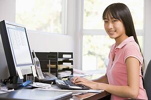 Teenage Girl Using Desktop Computer 