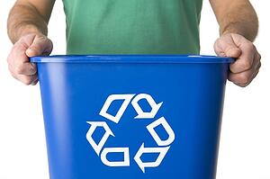 Man Holding Recycling Bin