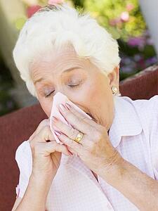 Woman Blowing Her Nose