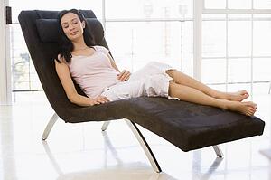 Woman sitting in chair sleeping