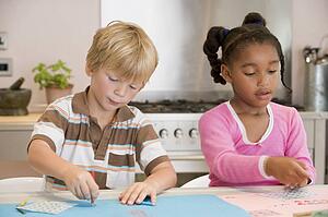 Two Young Friends Drawing Pictures